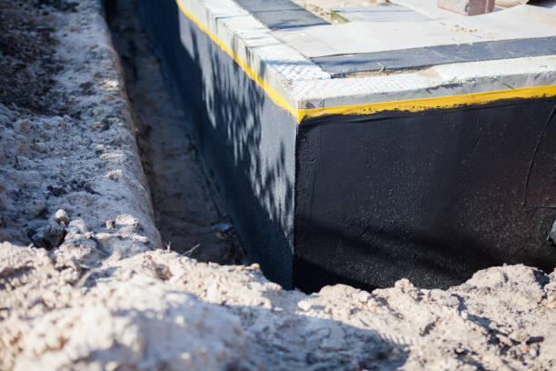 Professional Waterproofing technician working in Millfield, OH